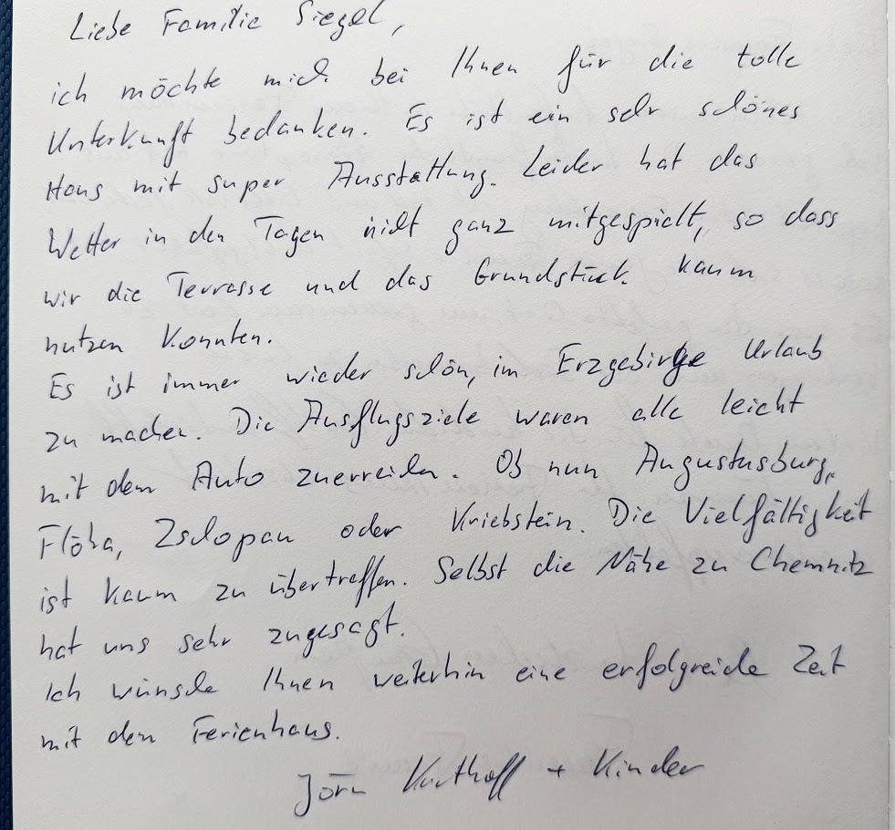 Handschriftlicher Gästebucheintrag von Jörn und Kinder
